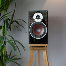 Load image into Gallery viewer, Lifestyle shot of Audio Chic Solid Oak Speaker Stand with Extra Layer of Isolation