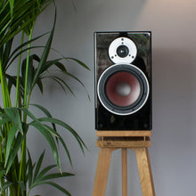Load image into Gallery viewer, Lifestyle shot of Audio Chic Solid Oak Speaker Stand with Extra Layer of Isolation