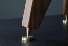 Load image into Gallery viewer, Up-close picture of Solid brass speaker spikes and shoes used to enhance audio clarity and reduce noise