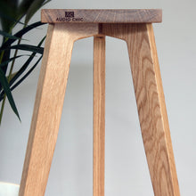 Load image into Gallery viewer, The Heron Solid Oak Standmount speaker stand with solid brass speaker spikes.