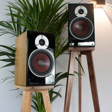Load image into Gallery viewer, Solid Oak and American Black Walnut Speaker Stands with Dali Bookshelf speakers perfectly seated ontop.