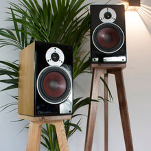 Load image into Gallery viewer, Solid Oak and American Black Walnut Speaker Stands with Dali Bookshelf speakers perfectly seated ontop.