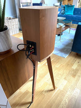 Load image into Gallery viewer, Shaped ATC SCM11 speaker on a Wooden speaker stand by audio chic on a wooden floor with a living room in the background