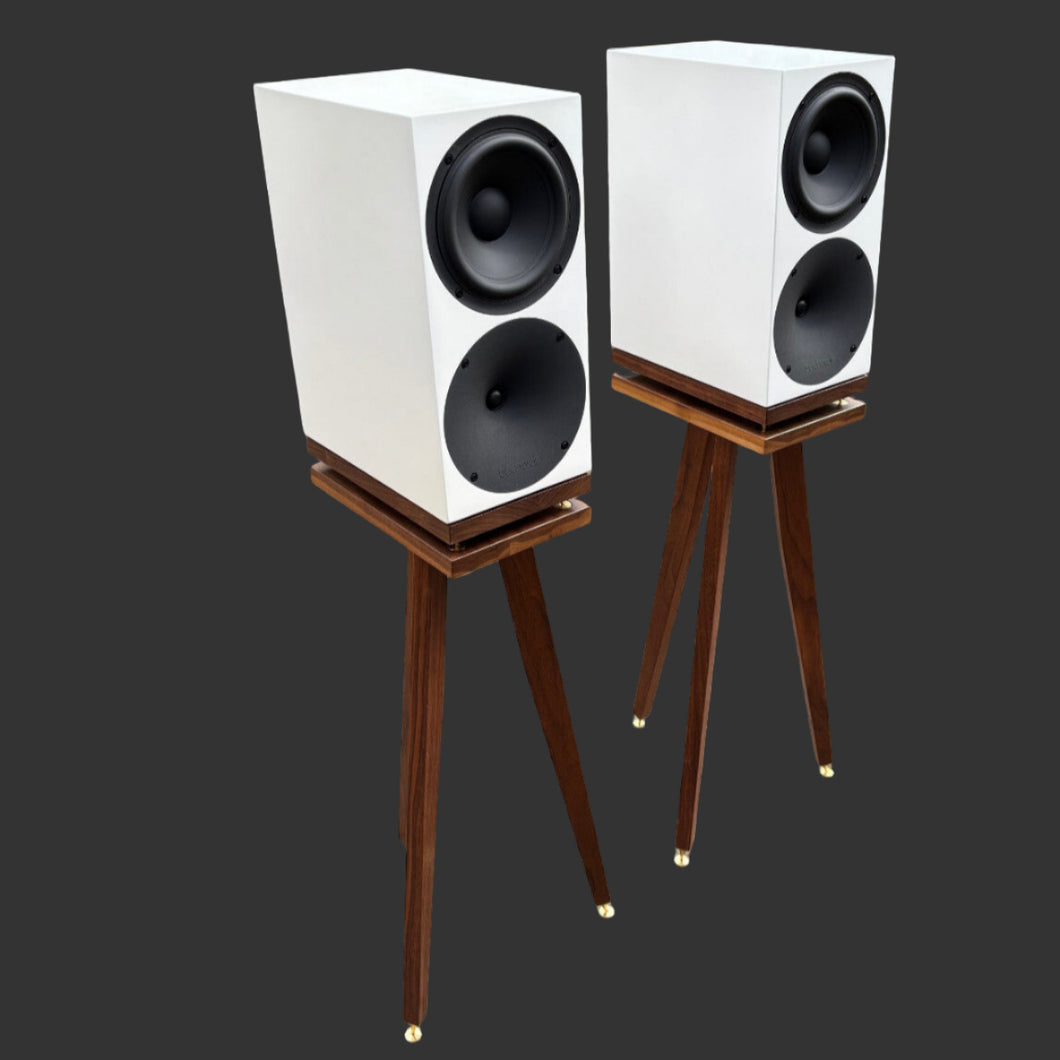 Pair of white Buchardt S400 MKII speakers on wooden stands