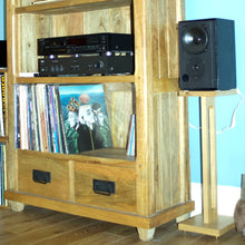 Load image into Gallery viewer, Harmony-speaker-stand-single-by-audio-chic and a Wooden entertainment centre with stereo equipment and records against a blue wall.