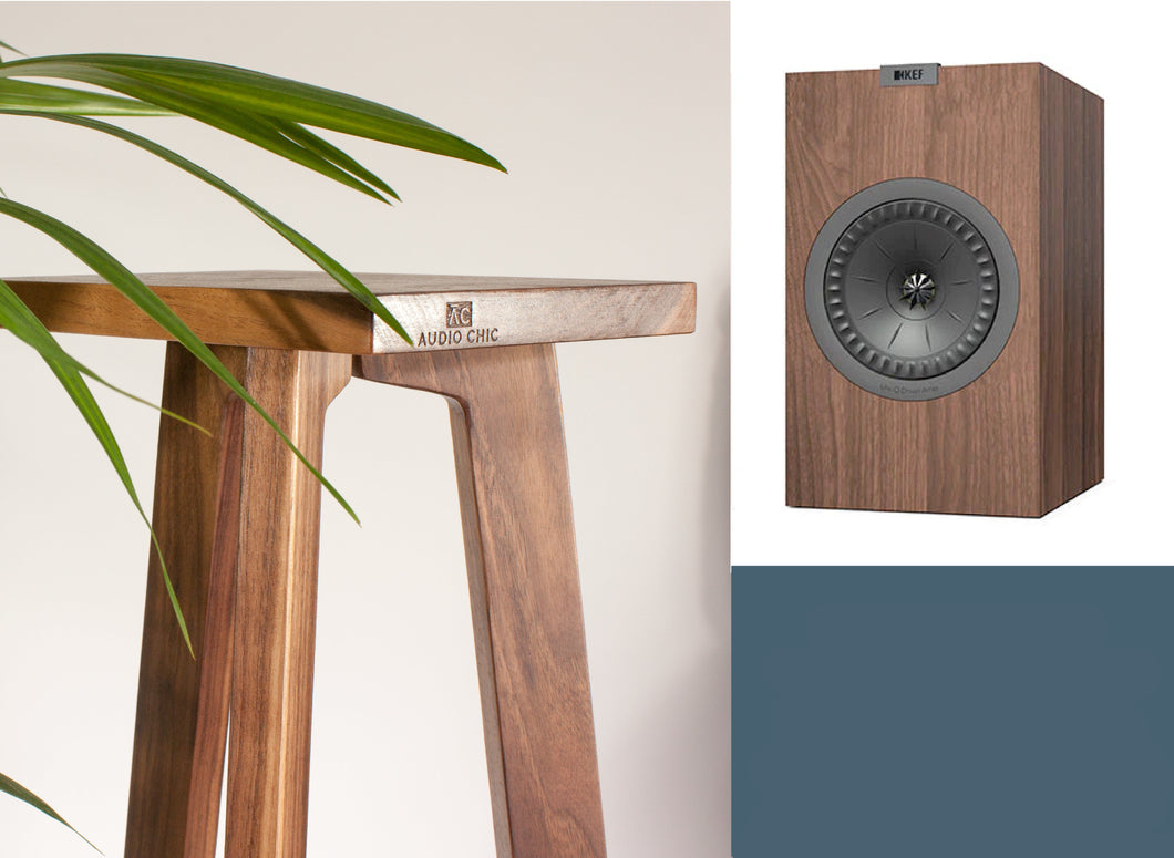 A pair of wooden speaker stands with a KEF Q350 speaker.