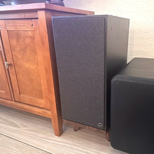 Load image into Gallery viewer, Klipsch-The-Nines-Speaker-stands-by-audio-chic on a wooden floor next to a wooden cabinet.