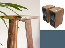 Load image into Gallery viewer, Speaker stands designed for Klipsch The Sevens speakers, made of wood, in natural timbers, with the brand logo visible.
