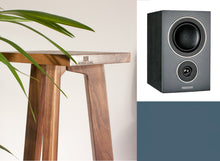 Load image into Gallery viewer, A speaker stand with a Mission LX-2 speaker. The Audio Chic stand is placed on a floor with a plant.