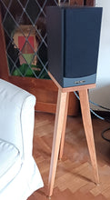 Load image into Gallery viewer, PMC-DB1-heron-700-speaker-stand-in-cherry-by-audio-chic in a room with a couch and decorative items.