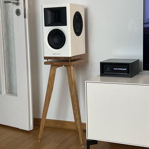 Radiant-Acoustics-Clarity-6.2-Bittern-600 mm speaker stands with plinths in Oak by Audio Chic in a room setting.
