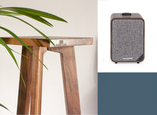 Load image into Gallery viewer, Ruark MR1 Mk2 bluetooth speaker with a walnut tri-leg speaker stand with the audio chic logo brand on the front
