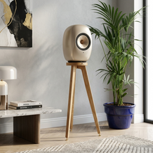 Load image into Gallery viewer, Audio Chic Speaker Stand with a KEF LS Luxe speaker on top in a stylish room.
