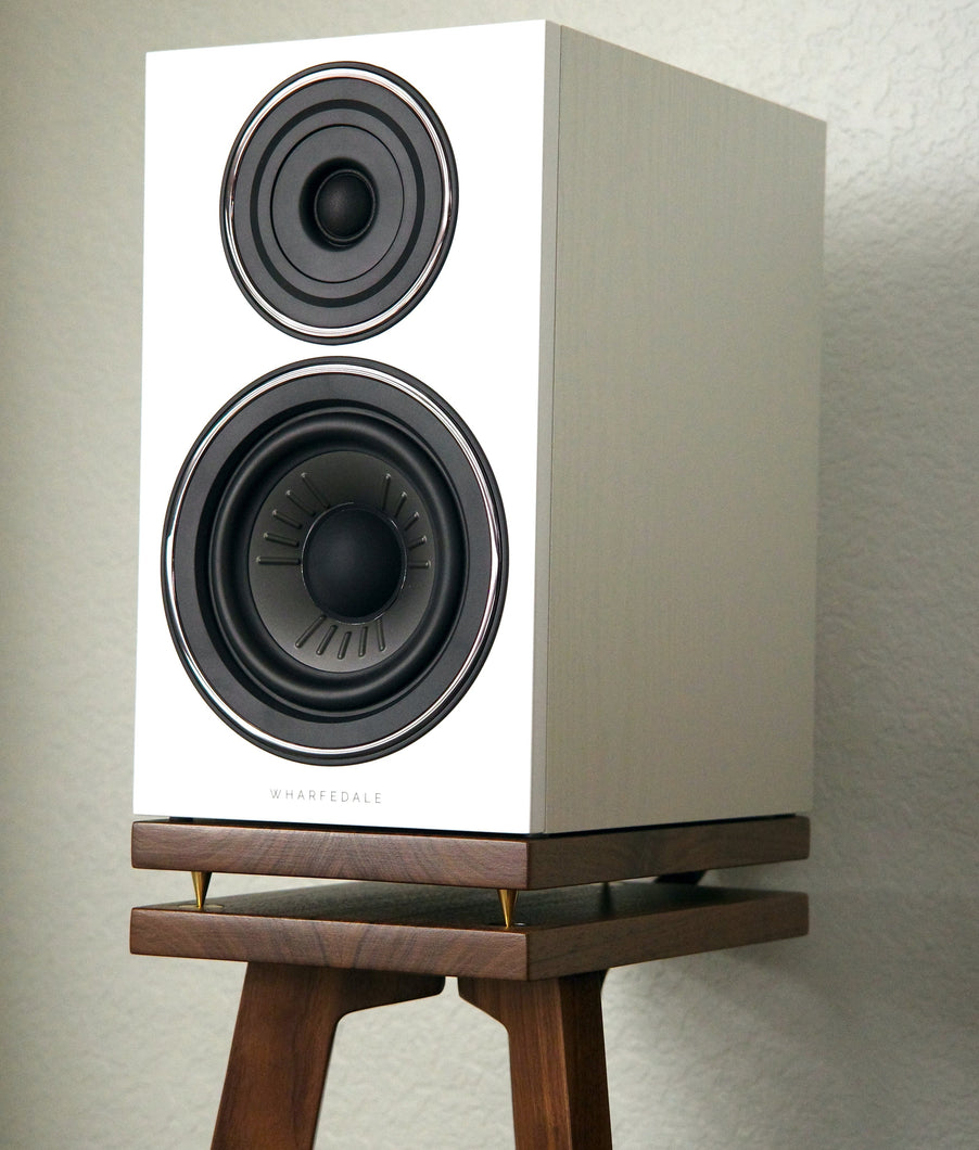 Wharfedale-diamond-12.2-speaker-stands-by-audio-chic against a plain wall