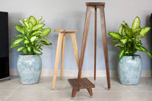 Load image into Gallery viewer, The Compact Snipe tri leg speaker stands next to the larger egret and crane.