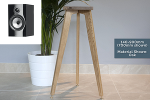 B&W 706 S2 Solid Oak Speaker Stands, Designed Specifically in a room with a grey wall.