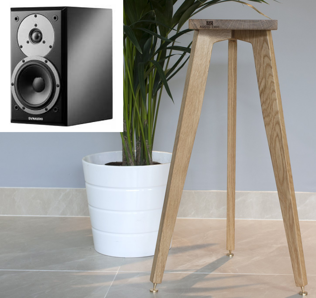 DynAudio Emit M10 Speaker stand with audio chic brand on a tall oak three leg speaker stand.