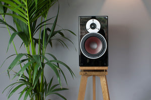 Lifestyle shot of Audio Chic Solid Oak Speaker Stand with Extra Layer of Isolation