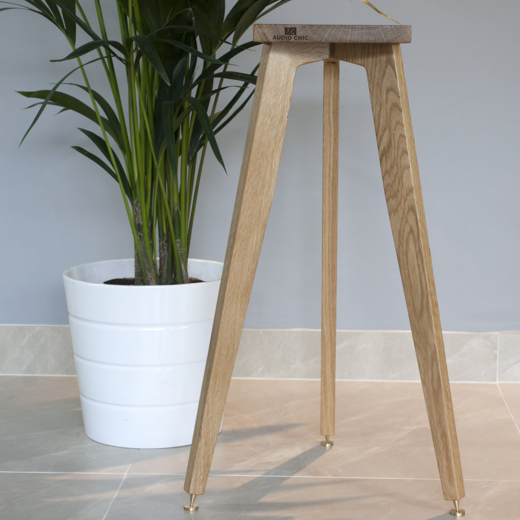 The Heron Tripod Hardwood Bookshelf Speaker Stands tall with speaker spikes and shoes
