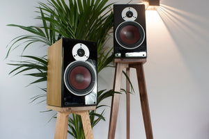 Solid Oak and American Black Walnut Speaker Stands with Dali Bookshelf speakers perfectly seated ontop.